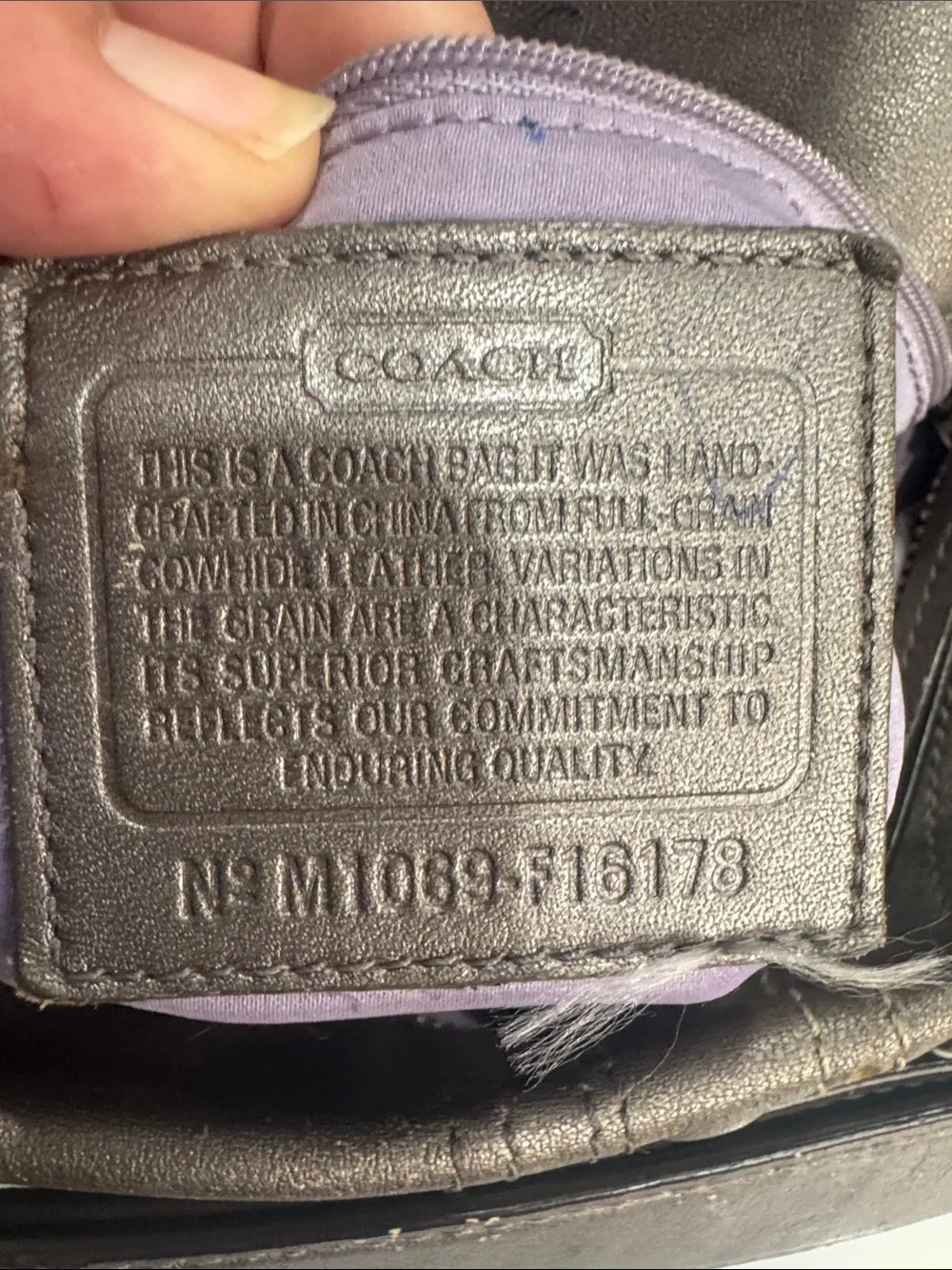 Coach Y2K Madison hobo bag featuring metallic pewter leather and silver studded